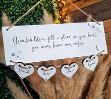 Load image into Gallery viewer, Grandchildren fill a place in your heart Plaque with hanging hearts
