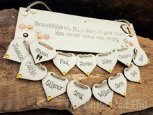 Load image into Gallery viewer, Grandchildren fill a place in your heart Plaque with hanging hearts
