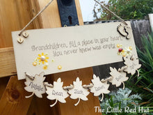 Load image into Gallery viewer, Grandchildren fill a place in your heart Plaque with hanging hearts
